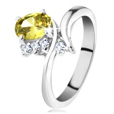 Искрящ пръстен в сребърен нюанс, овален циркон в жълт цвят