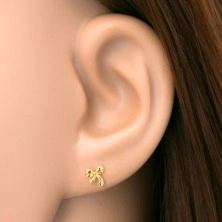 Пиърсинг за ухо от жълто злато 14K – лъскава вързана панделка